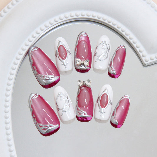 Chic Elegance Long Almond Pink and White Nails with Silver Accent and Gem Details