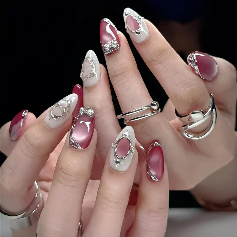 Glamorous Elegance Long Almond Shaped Pink and White Gradient Nails with Stunning Silver Accents