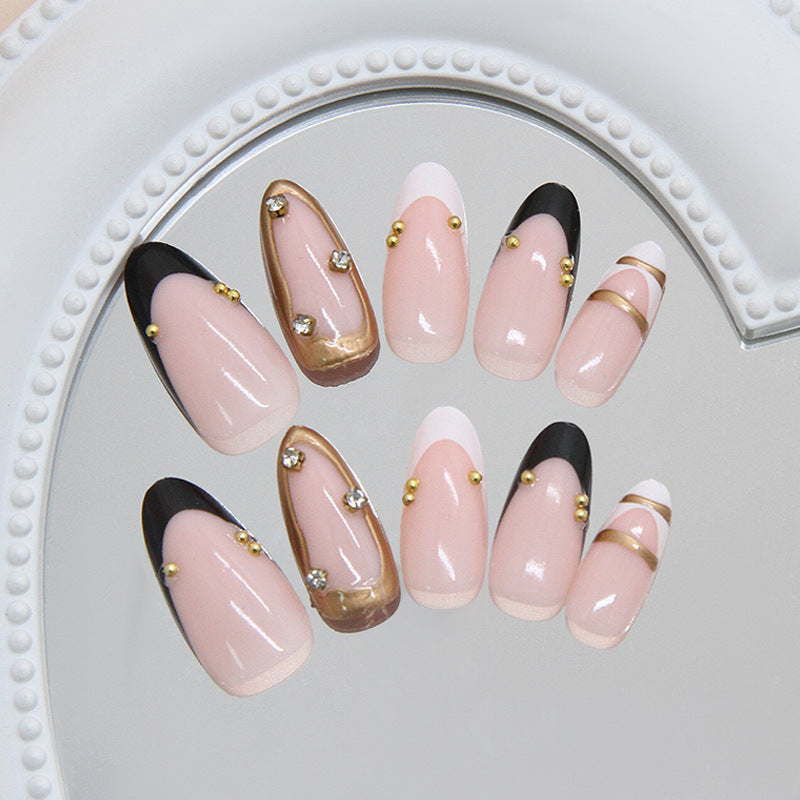 Elegant Glamour Long Almond Pink and Black Press-On Nail Set with Gold Accents and Rhinestone Details