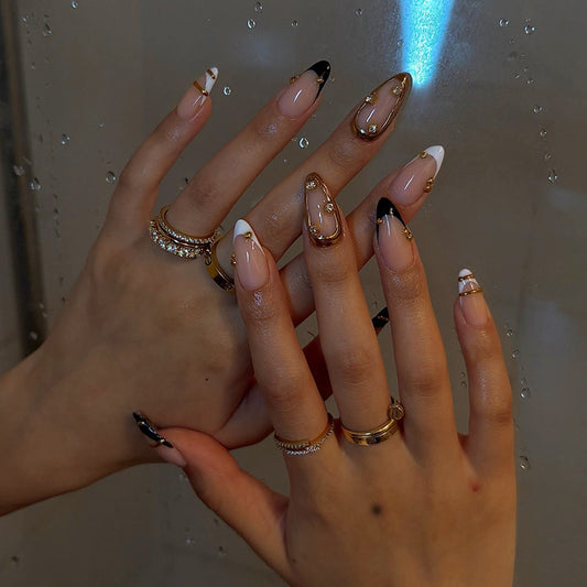Glamorous Elegance Long Almond Black and White Press On Nail Set with Unique Gold Accents