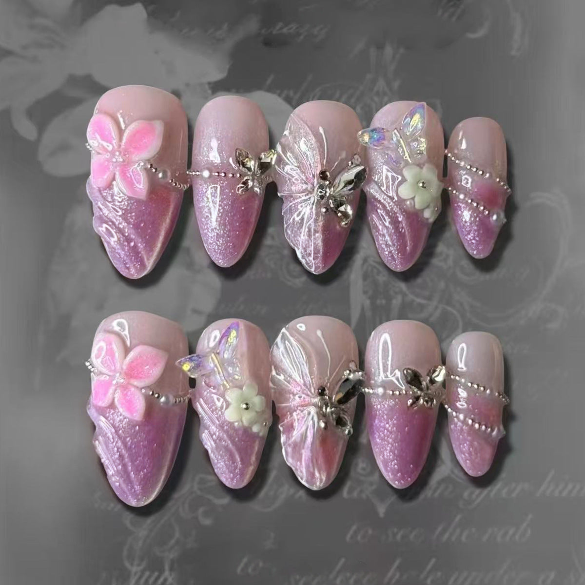 Whimsical Blossom Long Almond Pink Press On Nail Set with Glitter and Floral Embellishments