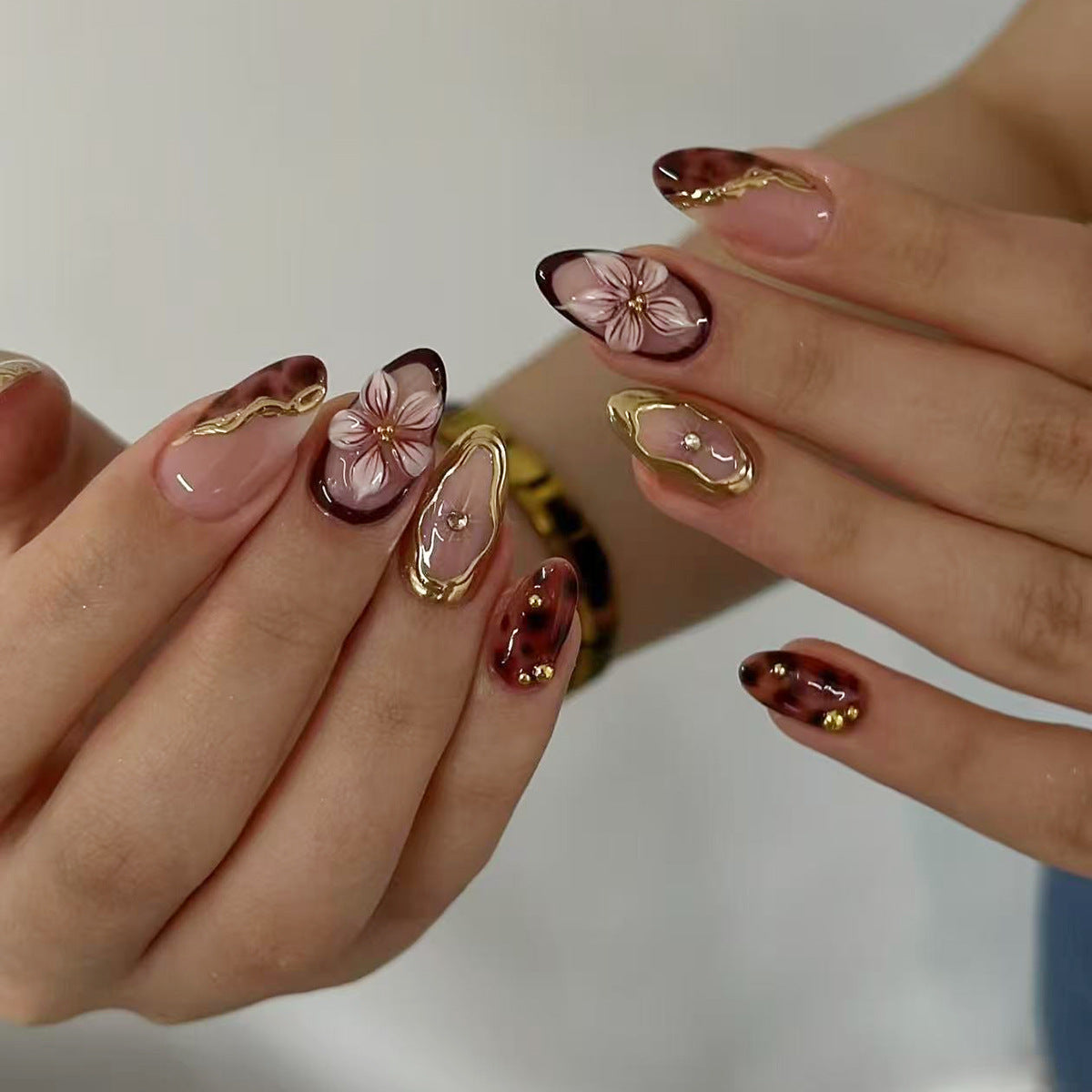 Blooming Elegance Long Almond Coffin Gradient Brown with Floral Embellishments and Gold Accents Press On Nail Set