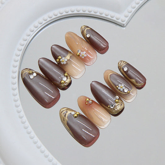 Elegant Serenity Press On Nail Set Long Almond Brown with Golden Accents and Floral Embellishments