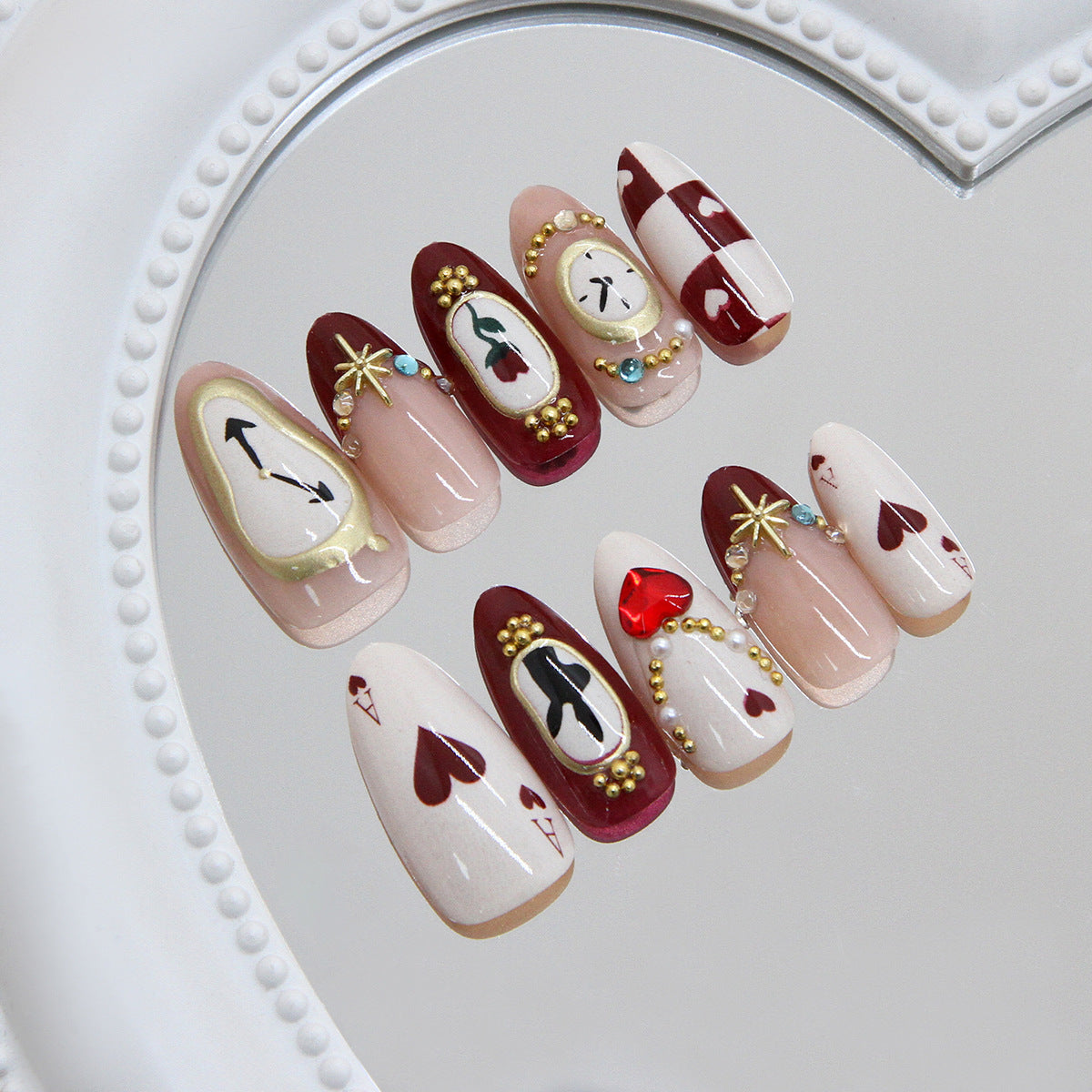 Enchanting Romance Long Almond Red and Cream Press-On Nails with Unique Heart and Clock Design