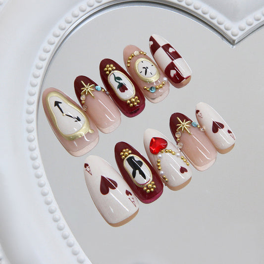 Enchanting Romance Long Almond Red and Cream Press-On Nails with Unique Heart and Clock Design