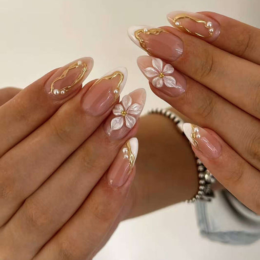 Blossoming Elegance Long Almond Beige Press On Nails with Charming Floral Accents and Elegant Gold Detailing