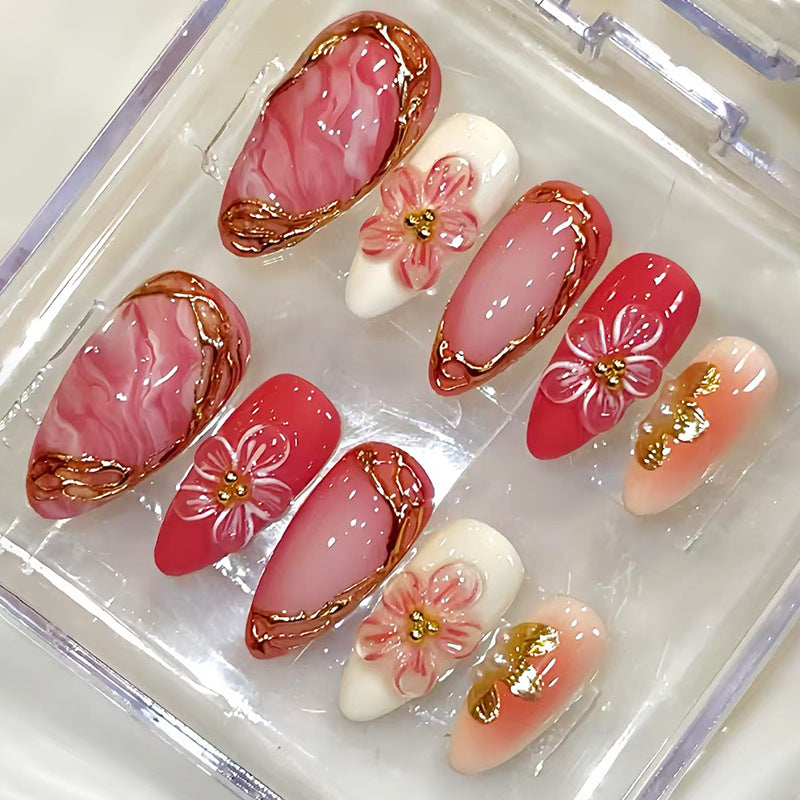 Blossom Elegance Long Almond Pink Nail Set with Floral Accents and Luxurious Gold Detailing