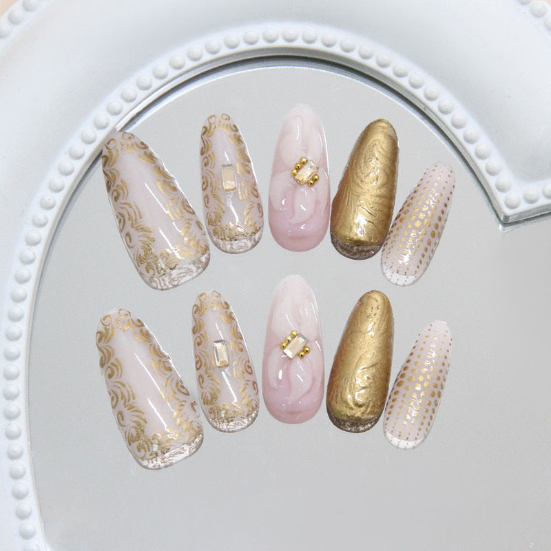 Gilded Elegance Long Almond Shaped Soft Pink and Gold Press On Nail Set with Intricate Design Accents