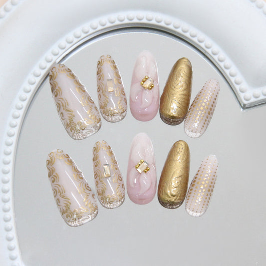 Gilded Elegance Long Almond Shaped Soft Pink and Gold Press On Nail Set with Intricate Design Accents