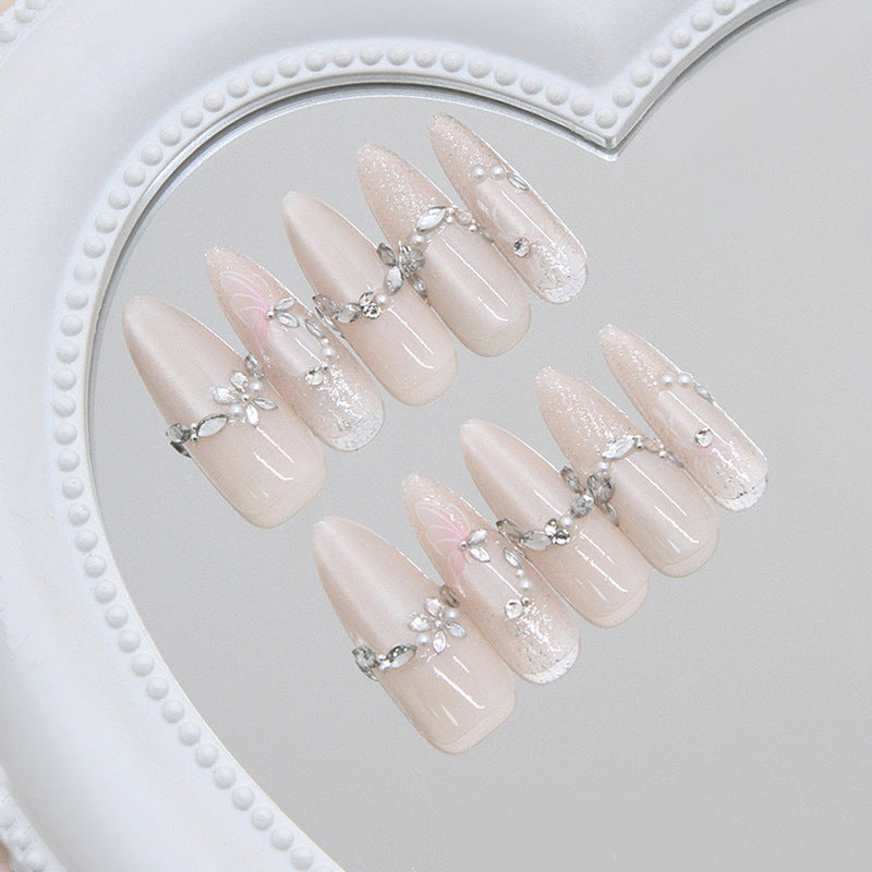 Chic Elegance Long Almond Beige Press On Nail Set with Delicate Floral Accents and Glitter Finish