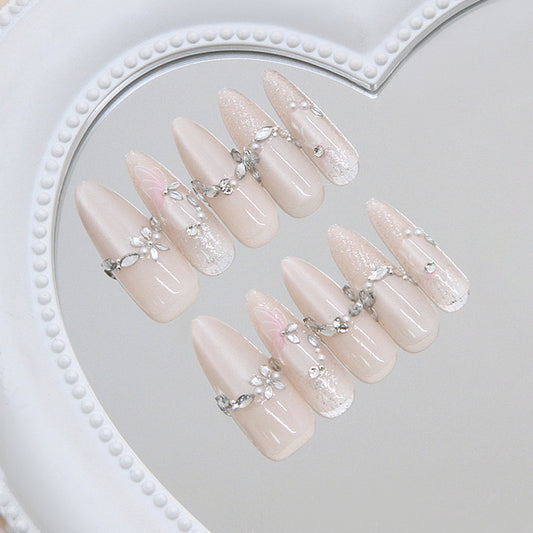 Chic Elegance Long Almond Beige Press On Nail Set with Delicate Floral Accents and Glitter Finish