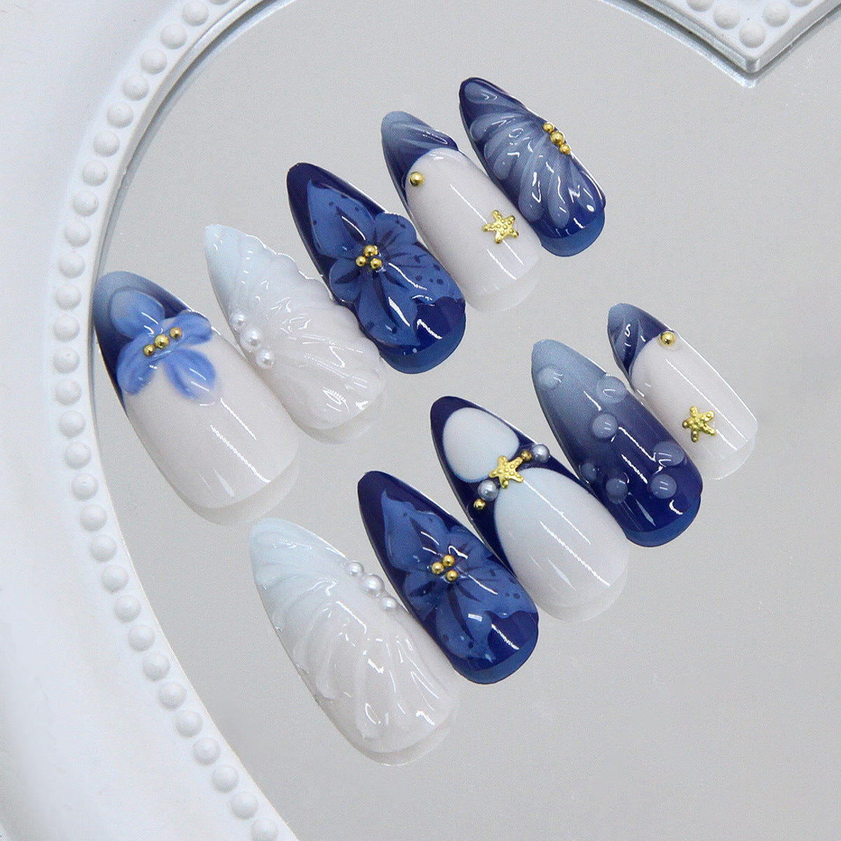 Whimsical Elegance Long Almond Blue and White Press On Nail Set Featuring Delicate Floral Accents and Gold Details