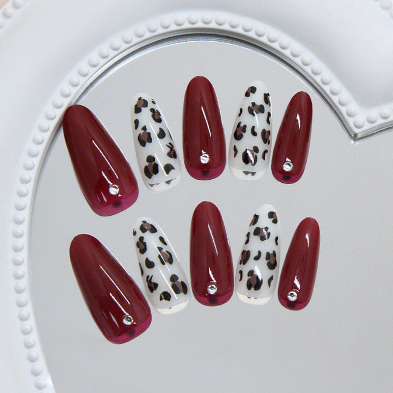 Wild Elegance Luxurious Long Almond-Shaped Deep Red and Chic Animal Print Nail Set with Sparkling Gems