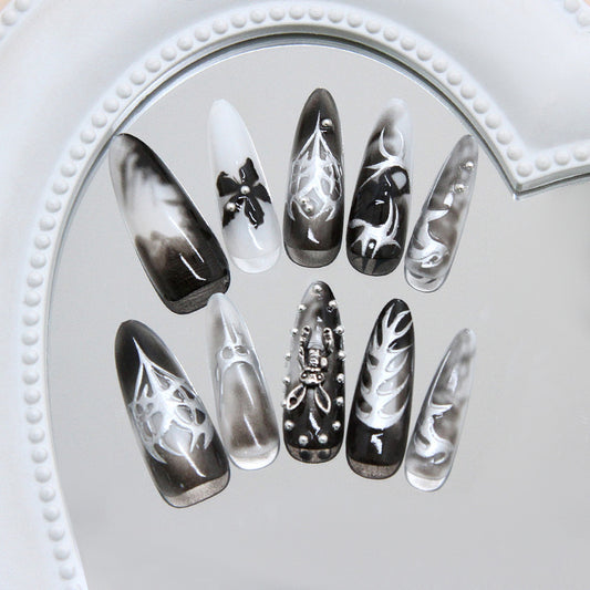 Gothic Elegance Long Stiletto Black and White Press On Nail Set with Intricate Design Features