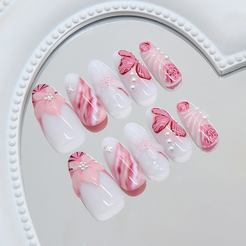 Blossom Breeze Long Almond Pink Nail Set with Elegant Floral Designs and Pearl Accents