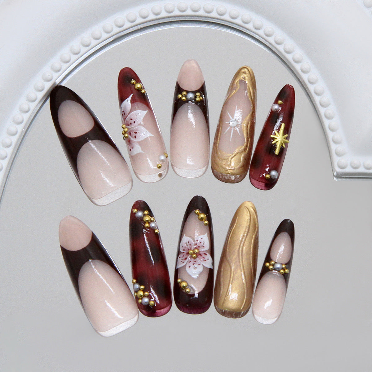 Chic Autumn Elegance Long Almond Burgundy and Beige Press-On Nail Set with Floral Accents and Gold Detailing