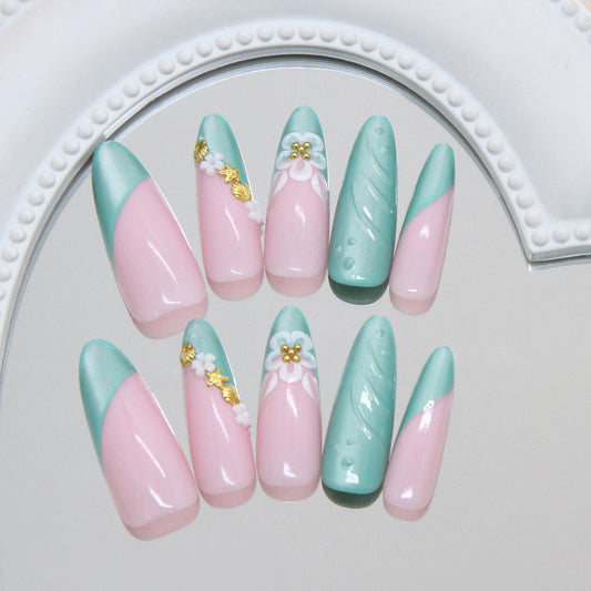 Charming Spring Blossom Long Almond Pink and Teal Nail Set with Floral Accents and Shimmering Details