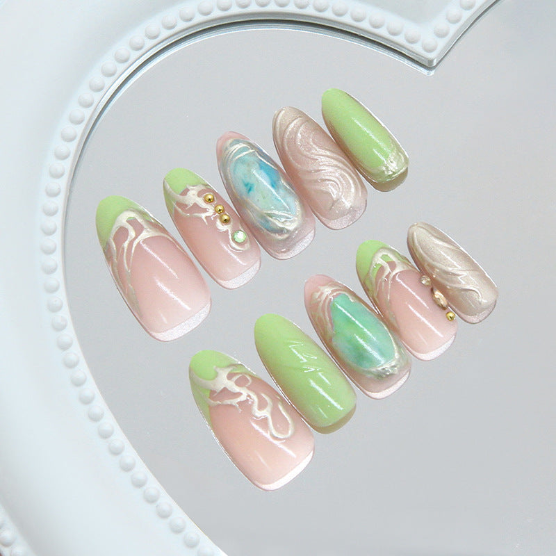 Whimsical Serenity Long Almond Shaped Pastel Green and Pink Nails with Marble Design and Elegant Gem Accents