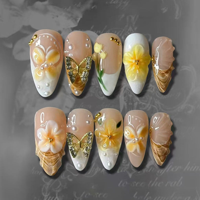 Charming Floral Elegance Long Almond Shaped Beige and Yellow Press On Nail Set with Butterfly and Pearl Accents