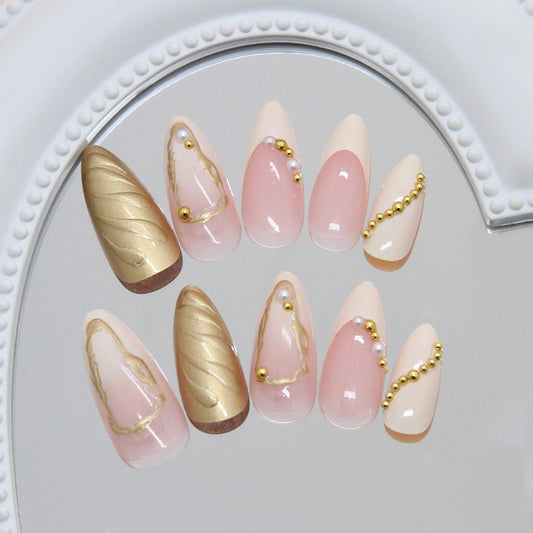 Glamorous Gold and Pink Long Almond Shaped High Shine Nail Set with Elegant Metallic Detail