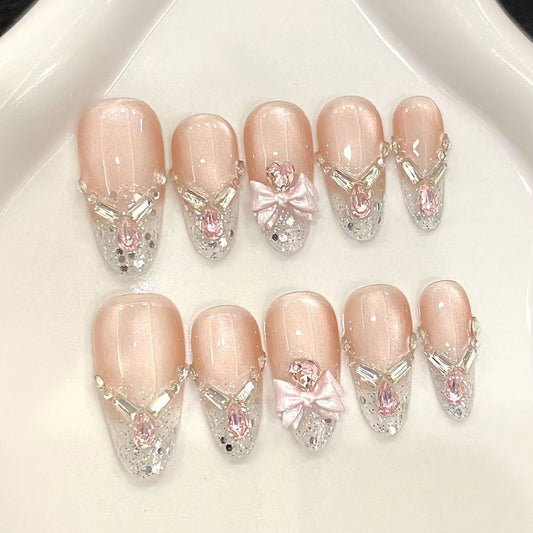 Whimsical Elegance Medium Oval Pink with Sparkling Bow and Gemstone Accent Press-On Nail Set