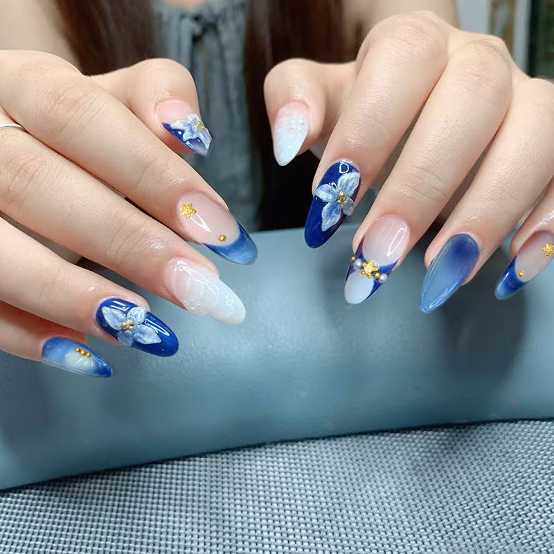 Mystical Ocean Themed Long Almond Shape Blue Ombre Press On Nail Set with Floral Accents and Glitter Details