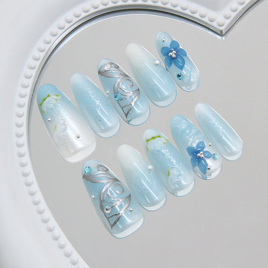 Ocean Breeze Dreamy Long Almond Blue Press On Nail Set with Floral Accents and Sparkling Gems