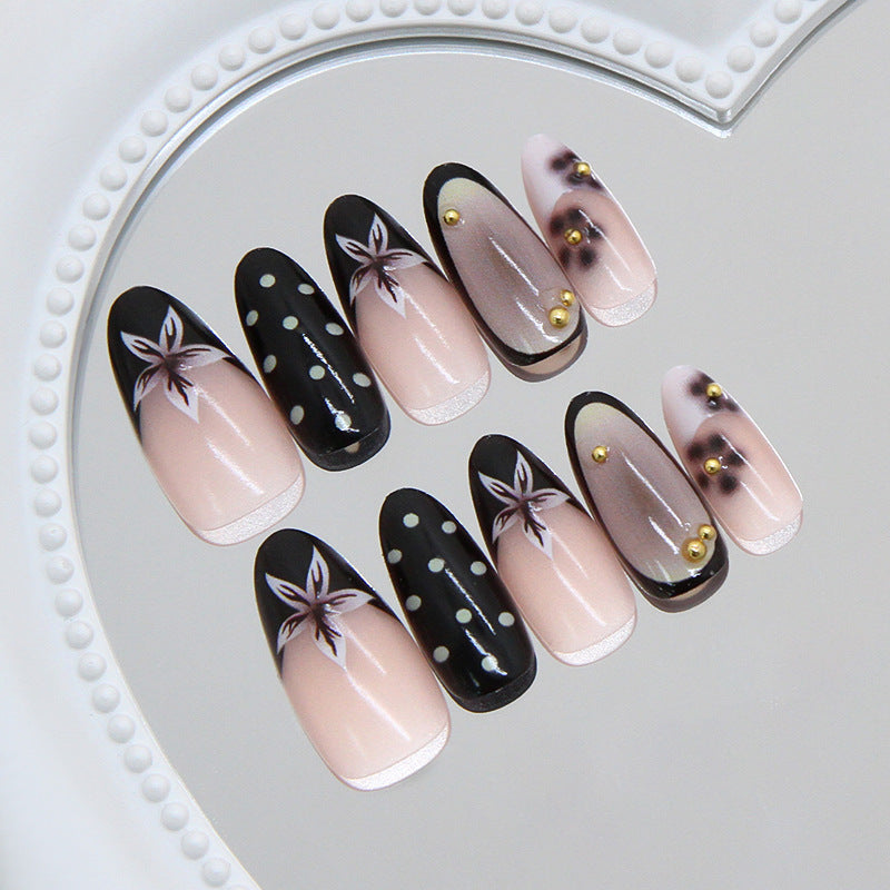 Elegant Nightfall Press-On Nail Set Long Almond Shape Soft Pink and Jet Black with Floral Design and Gold Accents