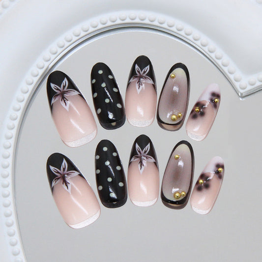 Elegant Noir Long Almond Shaped Black and Beige Nail Set with Floral Designs and Gold Accents