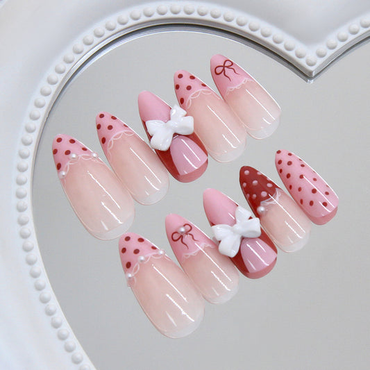 Chic Whimsical Stiletto Press On Nail Set Long Almond Pink with Bow Decoration and Polka Dots