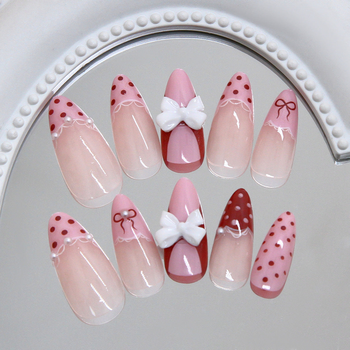 Charming Celebration Pink Long Almond Press On Nail Set with Decorative Bow and Polka Dot Accents
