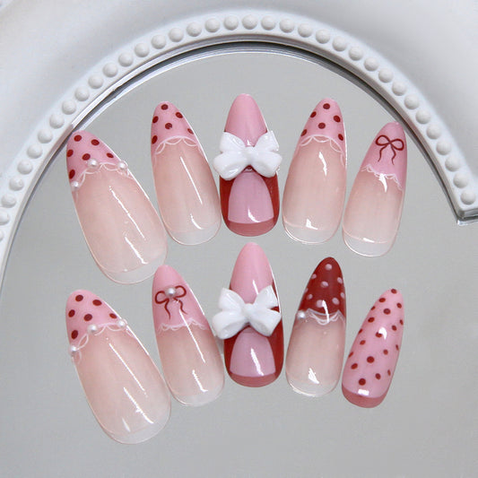 Charming Celebration Pink Long Almond Press On Nail Set with Decorative Bow and Polka Dot Accents