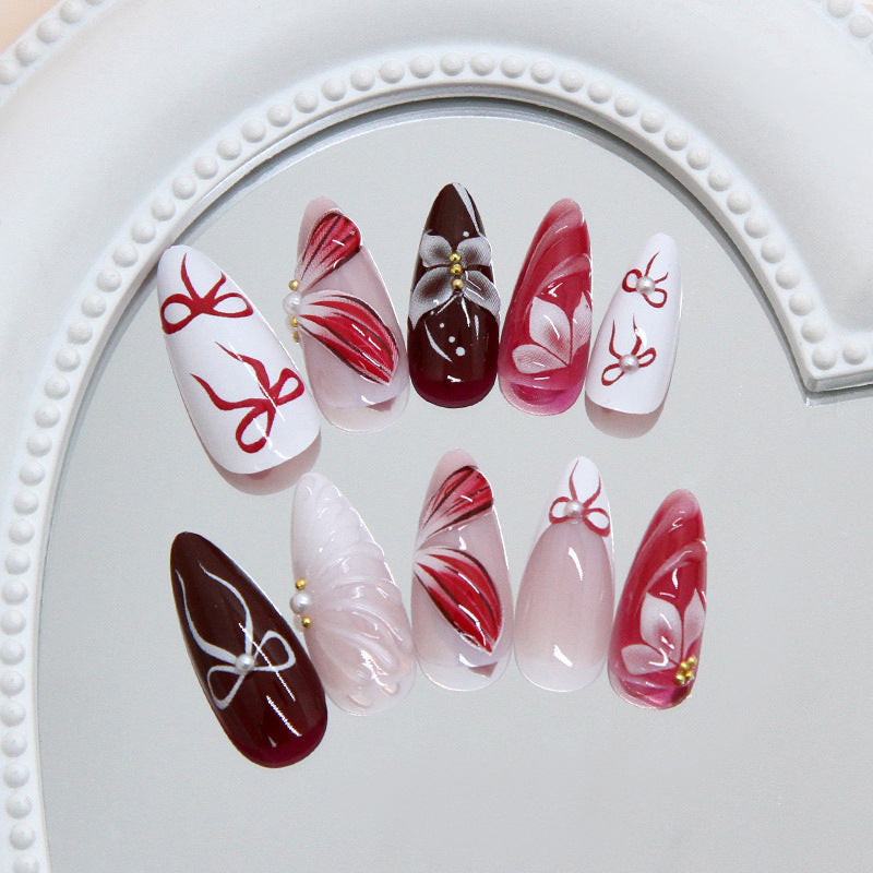 Elegance Unleashed Long Almond Burgundy and Pink Nail Set with Floral and Bow Accents