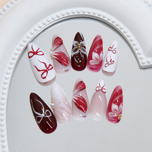 Elegance Unleashed Long Almond Burgundy and Pink Nail Set with Floral and Bow Accents