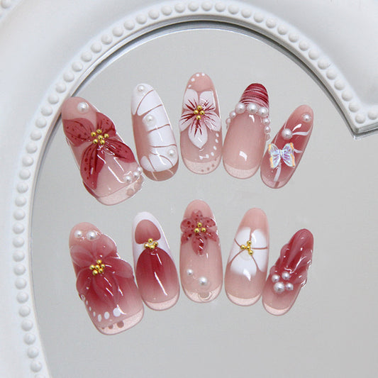 Romantic Blooms Long Almond Pink Nail Set with Floral Embellishments and Pearl Accents