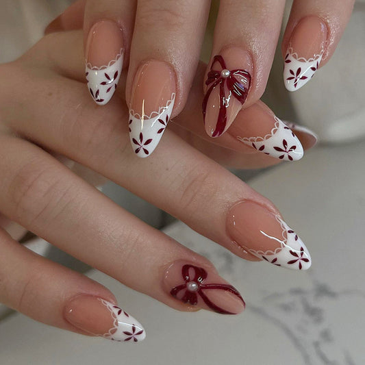 Chic Floral Elegance Long Almond-shaped Pink and White Press On Nail Set with Unique Bow Decor