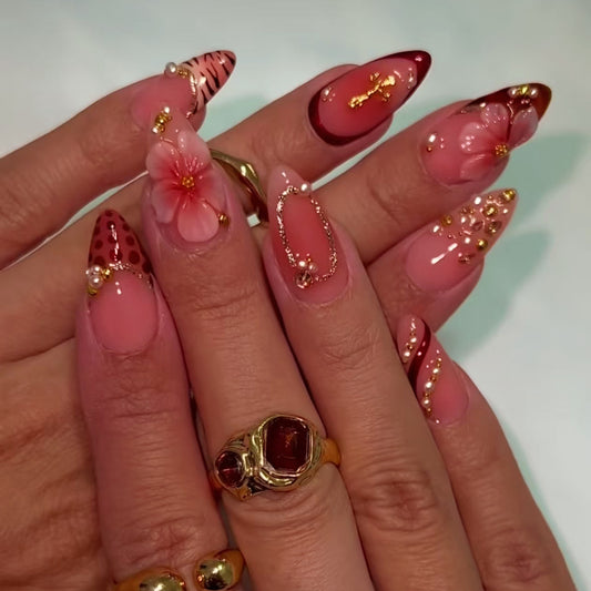 Glamorous Floral Medium Stiletto Pink Nails with Elegant Gold Accents