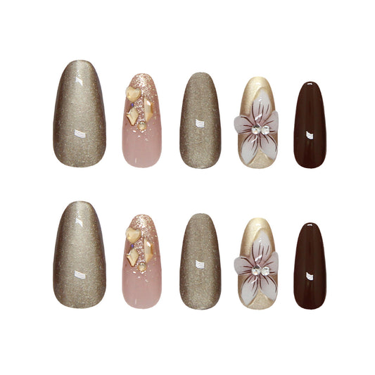 Elegant Autumn Twilight Press-On Nail Set in Long Almond Shape featuring Glitter and Floral Embellishments in Shimmering Gold and Rich Brown