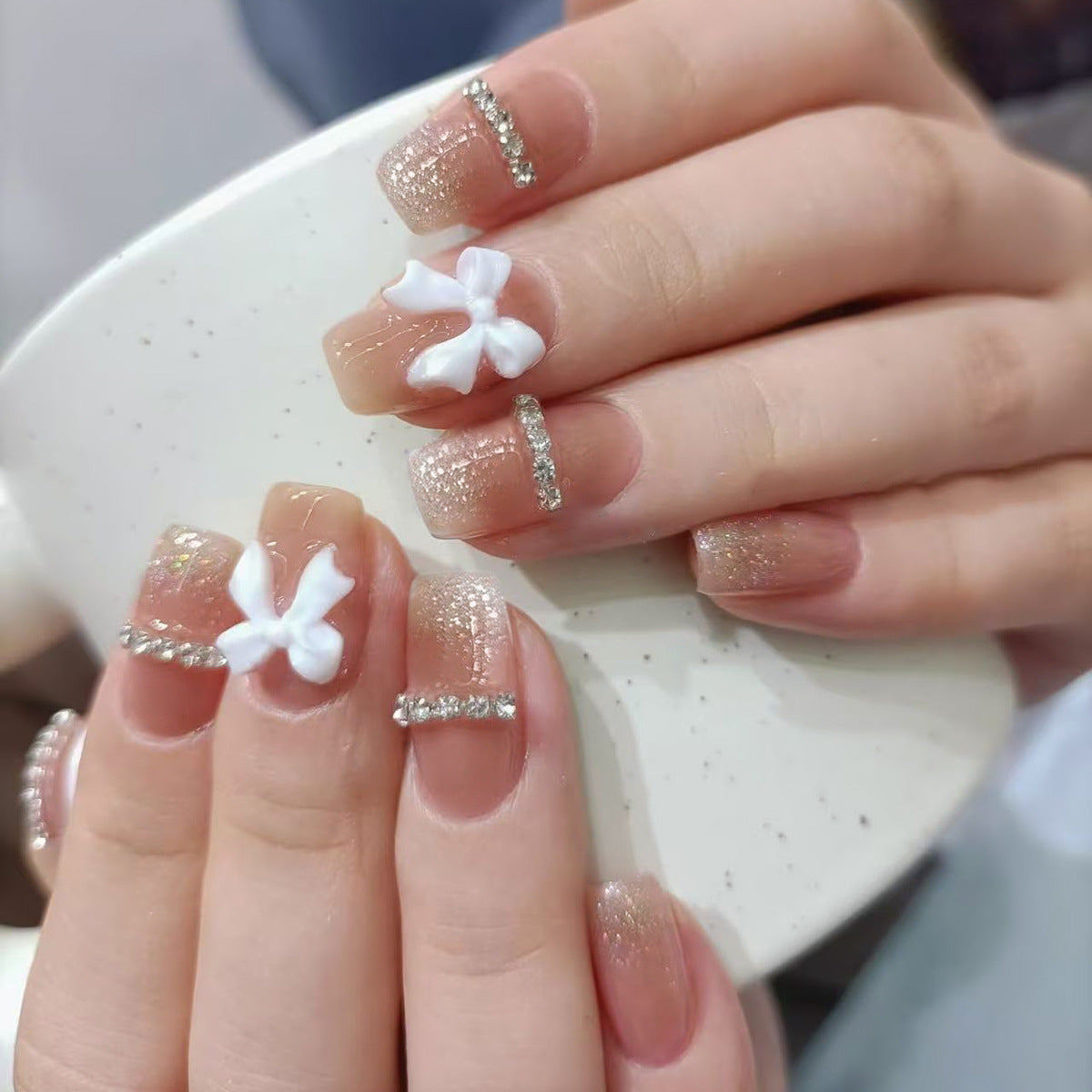 Charming Floral Elegance Medium Square Beige Press On Nail Set with Glitter and White Bow Accents
