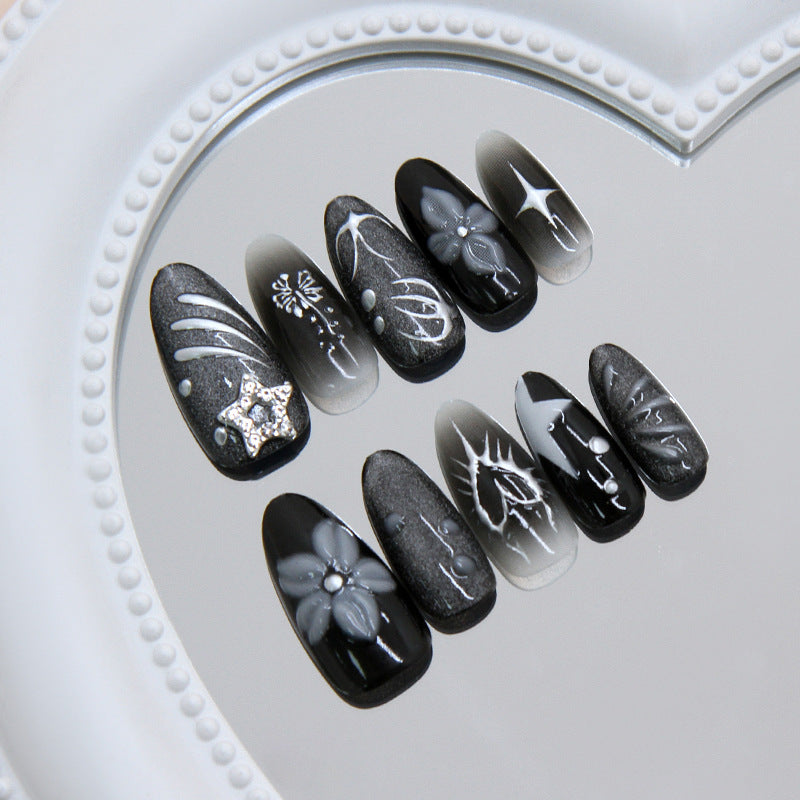 Elegant Noir Medium Almond Black with Floral and Star Accents Press on Nail Set