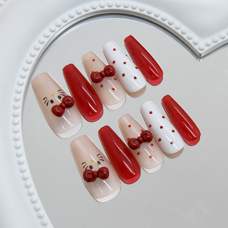 Festive Red and White Long Coffin Nails with Adorable Bow Details