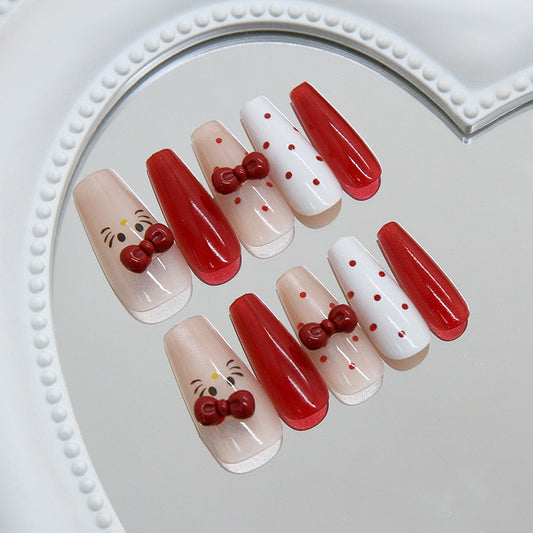 Festive Red and White Long Coffin Nails with Adorable Bow Details
