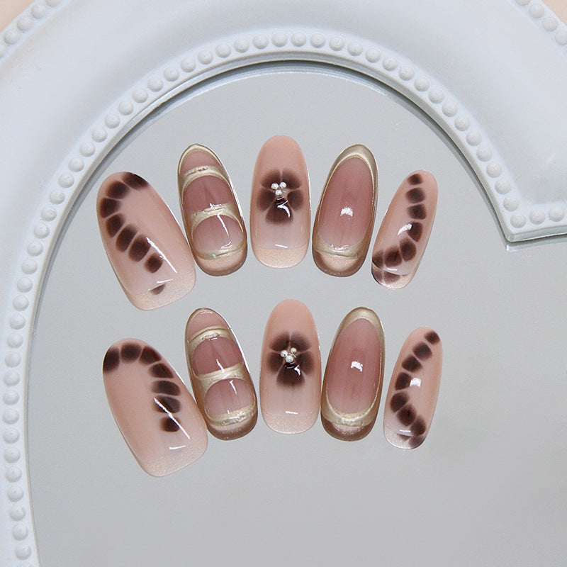Elegant Floral Design Long Oval Beige Press On Nail Set with Unique Accent Details