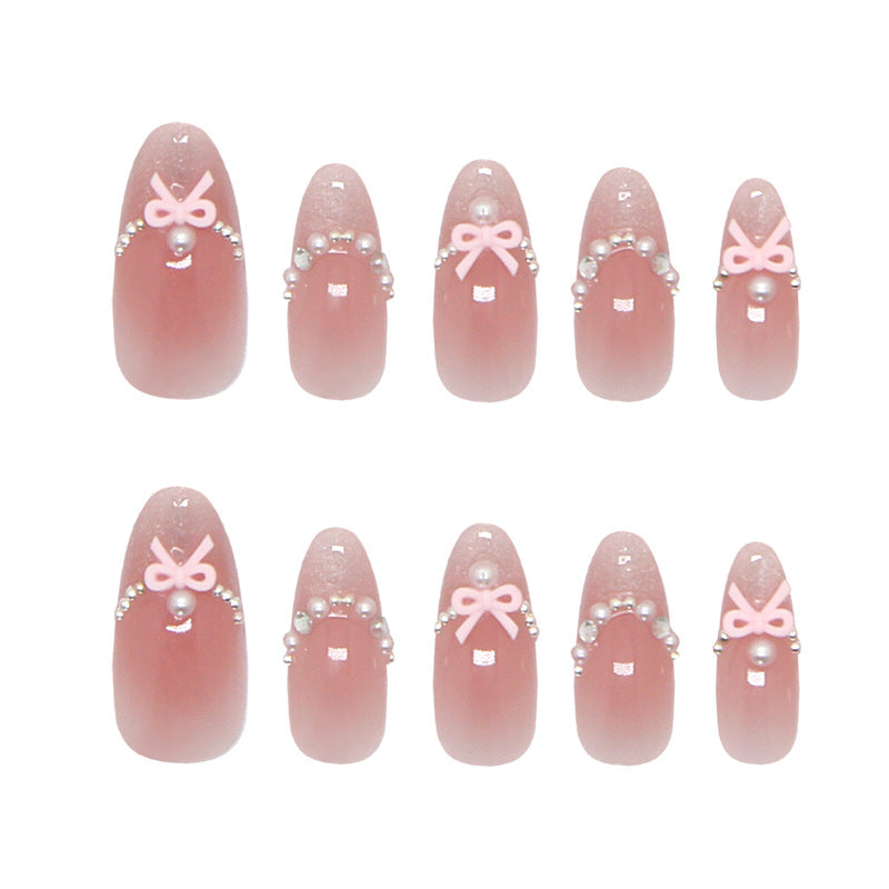 Whimsical Pink Medium Almond Press On Nail Set with Charming Bow Embellishments