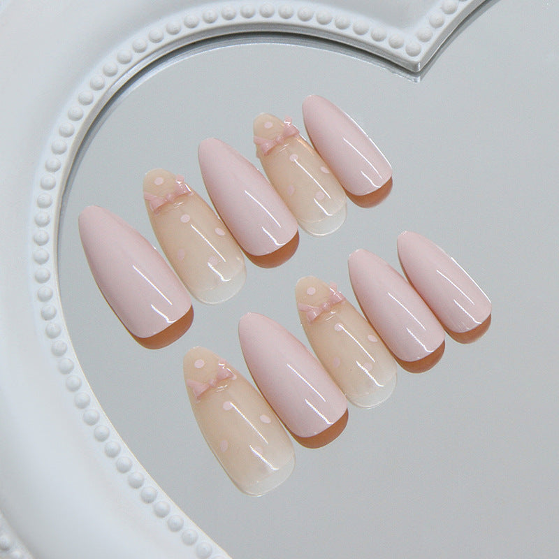 Chic Elegance Long Almond Blush Pink Press On Nails with Delicate Bow Detail