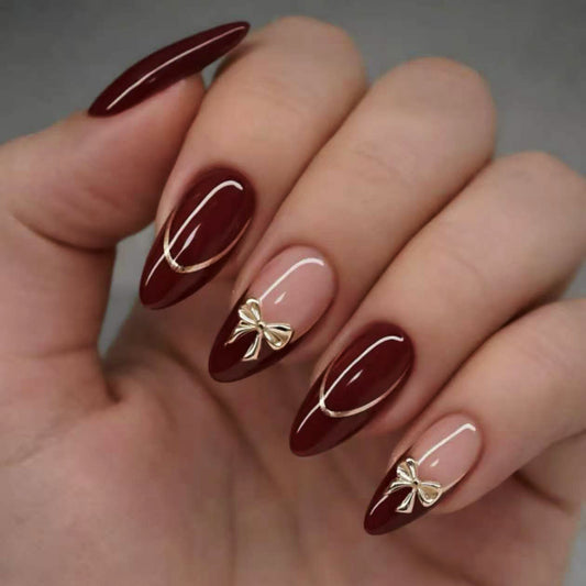 Elegant Charm Medium Almond Burgundy Press On Nail Set with Gold Bow Accents
