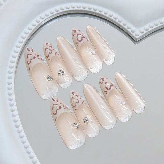 Chic Elegant Long Stiletto Blush Nails with Glitter Accents