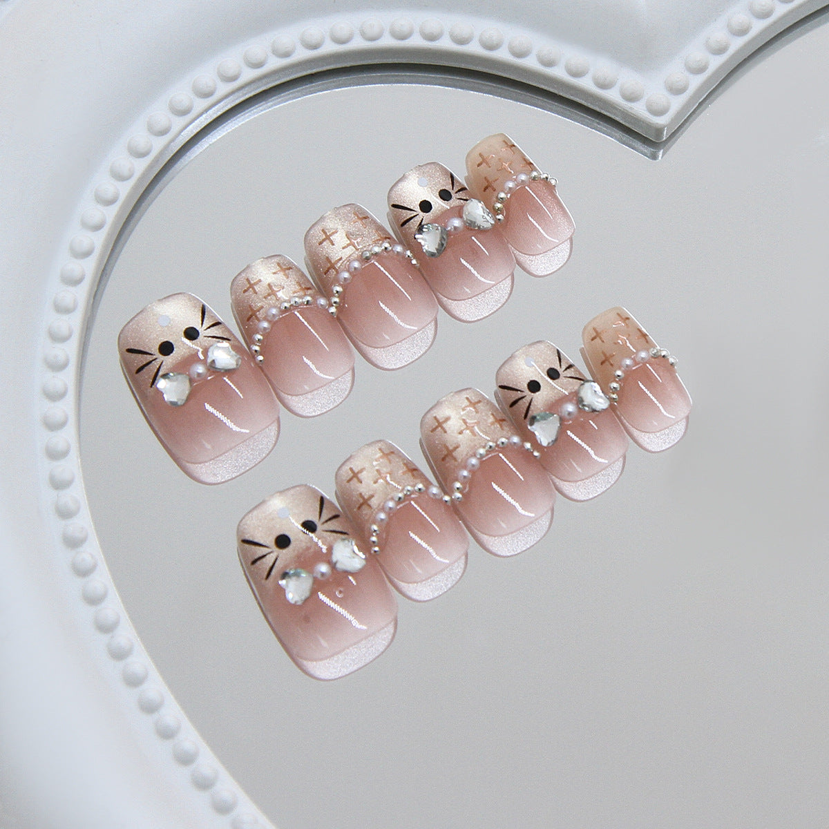 Whimsical Cat Inspired Short Square Pink Nails with Glitter Accents