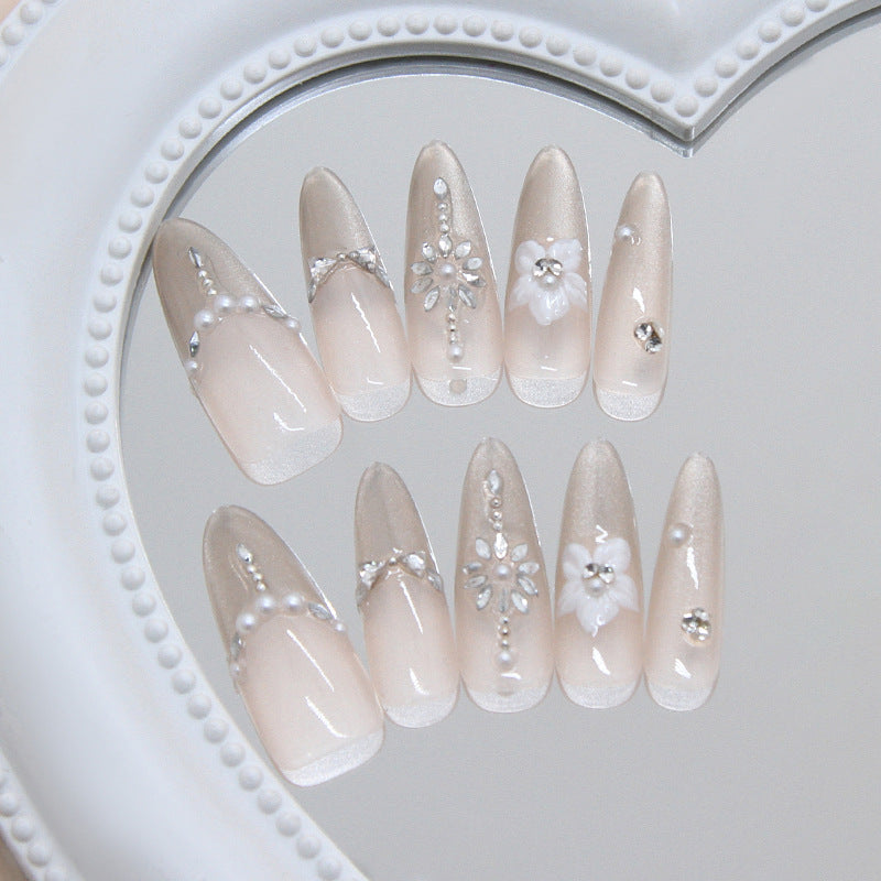 Elegant Blossom Long Almond Beige Press On Nail Set with Floral Accents and Rhinestone Details