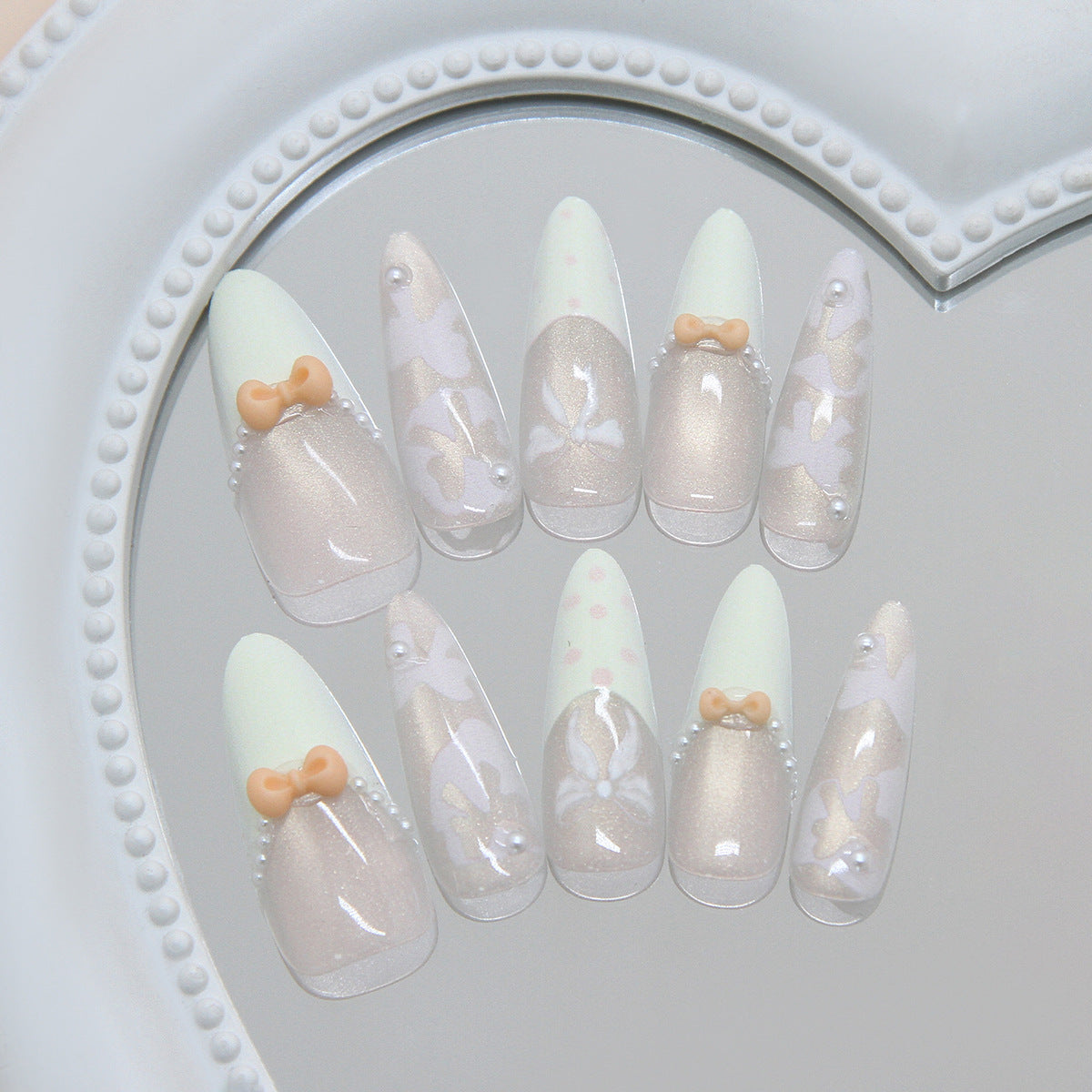 Whimsical Enchantment Long Almond Soft Green with Adorable Bow Accents and Pearl Details Press on Nail Set